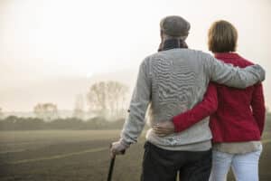 Senior father and his daughter after she makes sure her father's estate wishes are taken care of during his later years as he becomes more incapacitated through guardianship and power of attorney.